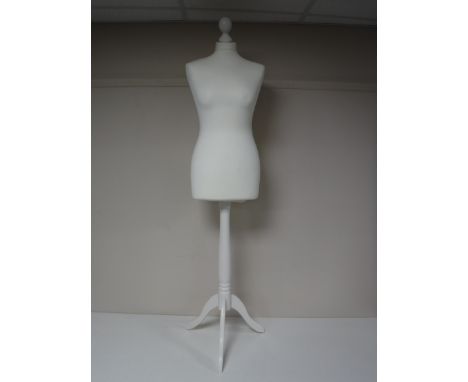 A mannequin on stand 
