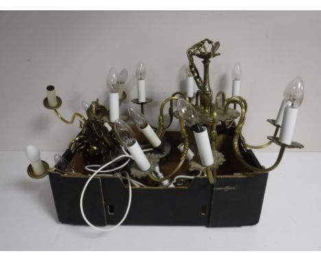 Two boxes of continental brass light fittings 