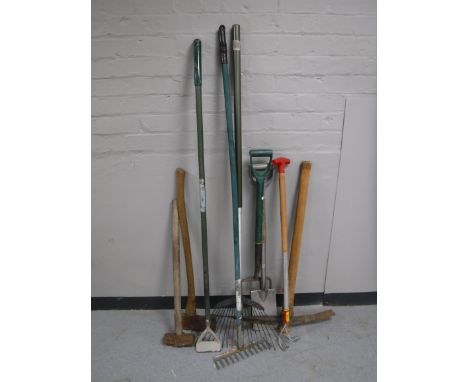 A box containing a quantity of garden tools