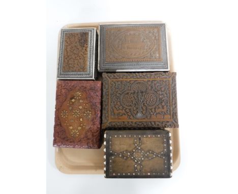 A tray of five carved Eastern trinket boxes 