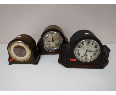Two early twentieth century mantel clocks, together with a walnut cased mantel clock