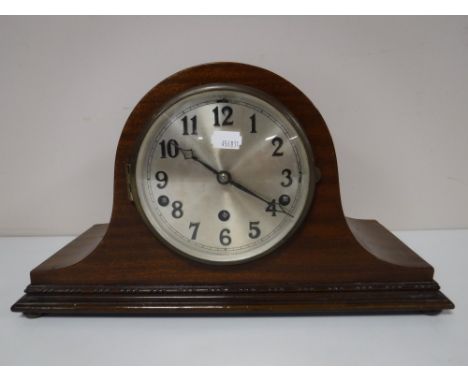 A mahogany cased mantle clock with silvered dial
