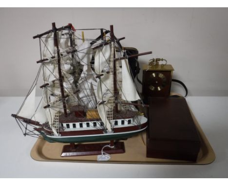 A tray of four wooden model ships on stands, cased binoculars, vintage Remington shaver and a carriage clock 