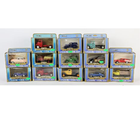 Sixteen ERTL classic die-cast vehicles, boxed, to include a 65 Cobra, together with twenty three ERTL vintage vehicles, boxed