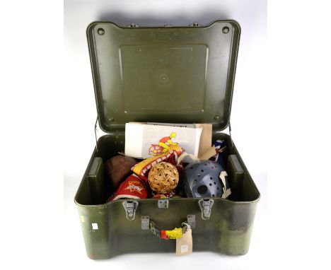 A post-war Russian box for a tinplate clockwork motorcycle, a vintage leather football, ice hockey mask and related collectab