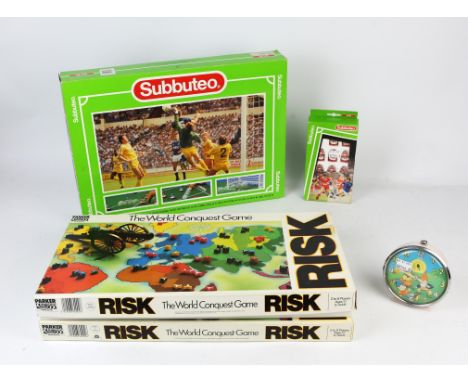 A Photon electric double player target game, C.1986, a Subbuteo table football game, a Smiths 'Noddy' alarm clock, two 'Risk'