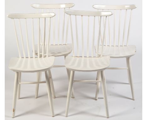 Ercol: four white painted spindle back dining chairs, 83cms high.