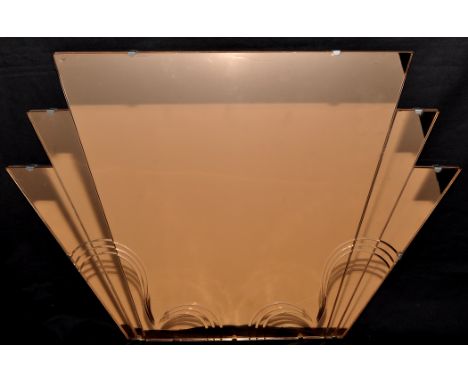 An Art Deco rose tinted wall mirror, 76 x 52cms.PROVENANCEBy repute from the RMS Mauretania.