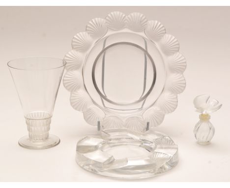 Lalique: shell dish with scallop rim; an ashtray; a wine glass with geometric design stem, all signed; together with a Nina R