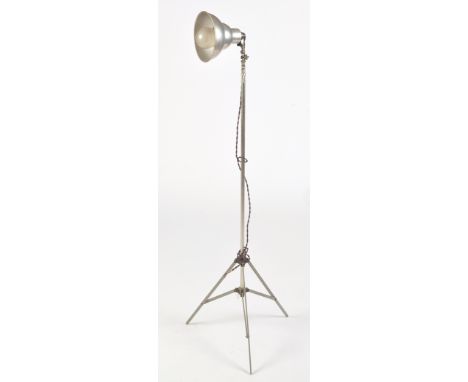 Photax: an industrial style spot lamp, with conical shade, chrome support and triform extending base, 143cms high approximate