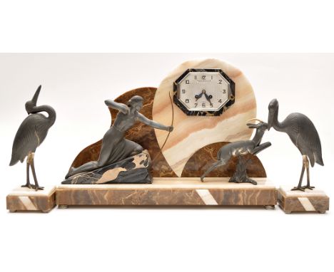 Raymond Pierre: an Art Deco marble and spelter clock garniture, depicting a huntress, gazelle and two storks, 41cms (16in.) h