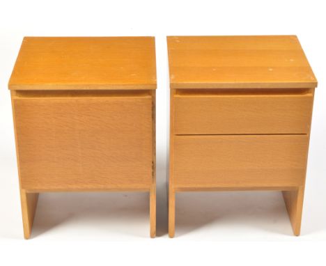 Meredew Furniture: a pair of light stained oak bedside cabinets, one fitted a hinged door, the other two drawers, each 40 x 3