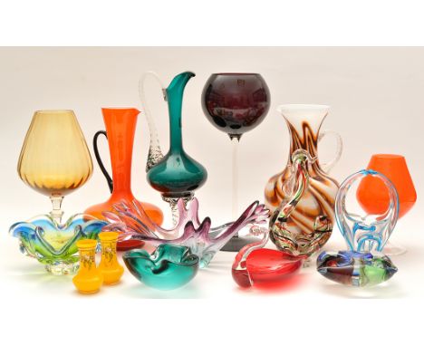 Studio glass: a tri-form dish; a splash effect dish in pink and blue; three large wine glass ornaments; a ewer; a pair of yel