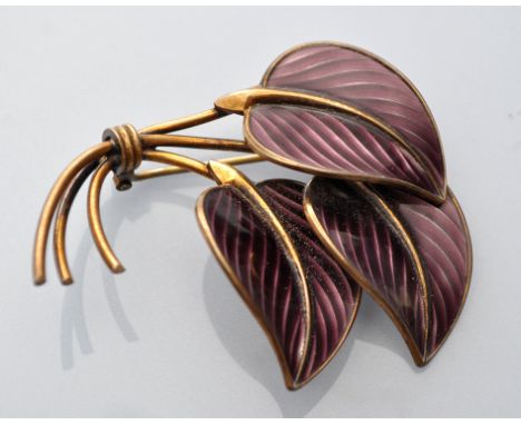 Hans Myhre, Norway: a silver gilt and purple enamel leaf pattern brooch, 5cms wide.