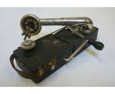 A Colibri "camera" gramophone with folding black metal case, and wind up motor, 10" wide (opened), 4 3/4" x 3 1/2" (folded) (