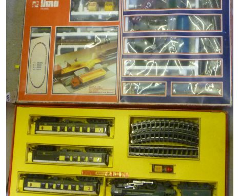Triang RS3 Passenger Train Set with Britannia locomotive, three Pullman coaches and track, box AF, F, and a Lima Diesel Goods