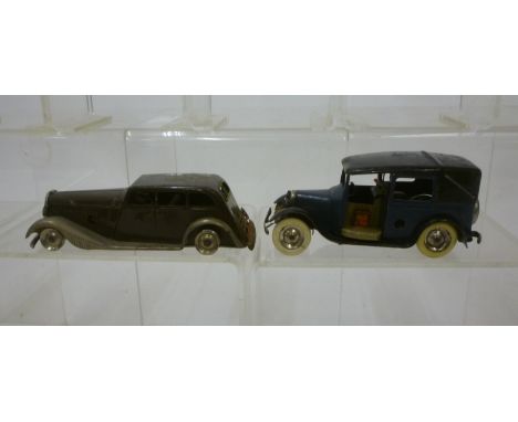 Two pre-war Minic clockwork vehicles, a taxi in blue/black, 4 1/2" long, and a Vauxhall car in brown, 5" long (Est. plus 18% 