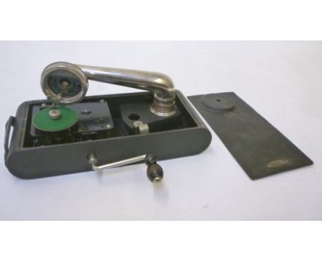 An Excelda "camera" gramophone with black japanned metal case and wind up motor, nickel plated pick up and arm, 11" x 4 3/4",