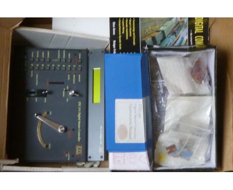 A Z.T.C. Digital Controller of 1998 Vintage with accessories and manuals and a Gauge Master Model D 12v train controller, all
