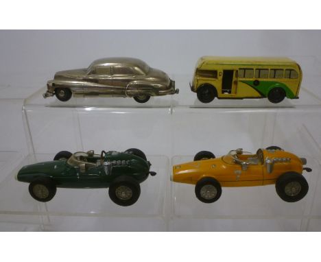 A Prameta Buick 405 clockwork powered, adjustable steering, two Schuco Ferrari Micro Racers, clockwork powered, and a Wells B