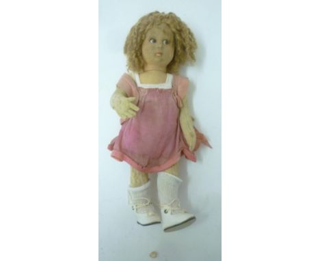 A Lenci felt doll with moulded painted face, brown curly wool wig, swivel joints, 13" high (Est. plus 18% premium inc. VAT)