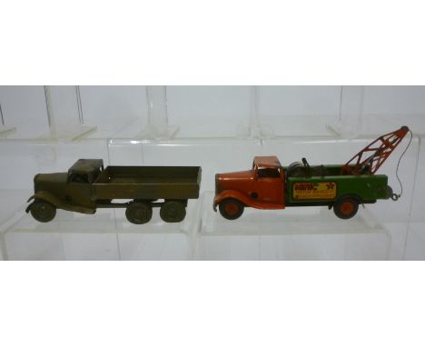 Two Minic clockwork vehicles, a six wheel camouflaged army lorry, 5 1/2" long, and a Breakdown truck with two motors, 6 1/2" 