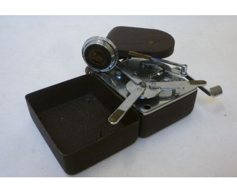 A Mikky Phone "camera" gramophone (Japan) with folding black metal case, matching horn, nickel plated interior, wind up motor