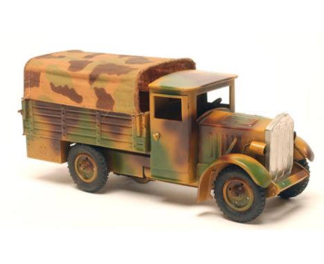 A Hauser tinplate four wheel army lorry with opening door and back flap, camouflage canvas rear cover, clockwork motor, rubbe