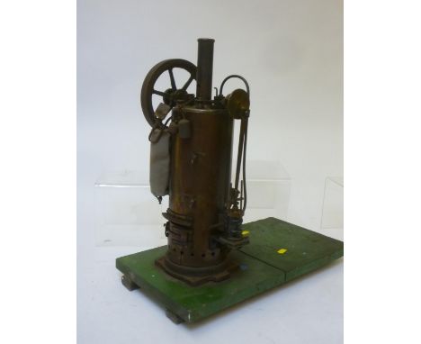 Single cylinder vertical steam engine and boiler, non reversing cylinder mounted on boiler with fly driven water pump, pressu