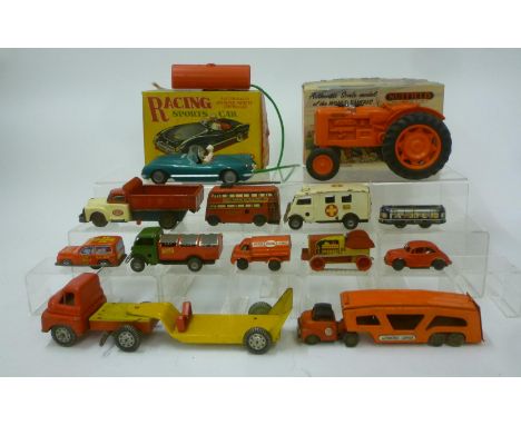 A Minic clockwork ambulance, a Minic clockwork dustbin lorry, eight small various tinplate and one plastic clockwork and fric