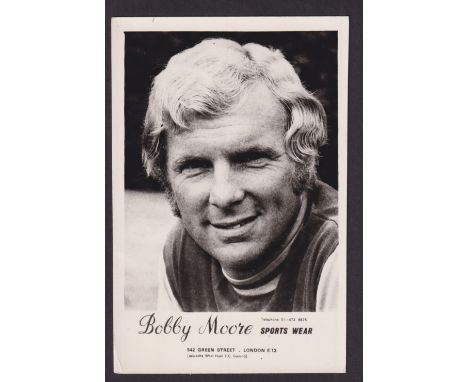 Trade card, Bobby Moore Sports Wear, postcard size photographic portrait card showing Moore in West Ham kit, plain back (vg) 