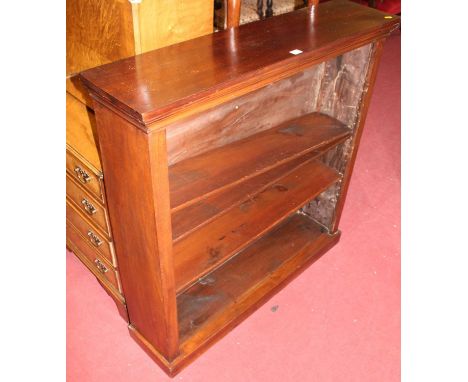 A mahogany freestanding open book shelf, with three adjustable shelves, width 106.5cm