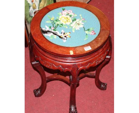 A contemporary Chinese hardwood and cloisonne enamel inset circular low urn table, dia. 41cm