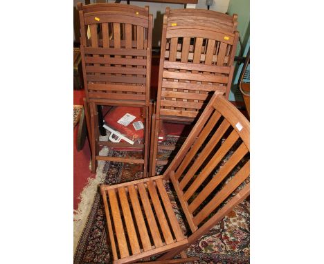 A set of six contemporary slatted teak folding picnic chairsCondition report: Some light wear only.All chairs good and strong