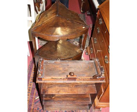 An early 19th century mahogany bow front three-tier wash stand, together with a 19th century oak open hanging wall shelf (2)