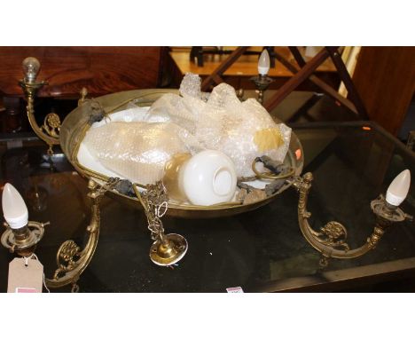 A gilt metal and milk glass inset four branch hanging ceiling light, with three replacement shades, approx dia. 100cm