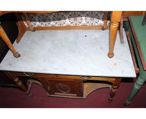 A late Victorian light oak white marble top and tile inset ledge back wash stand, having twin frieze drawers over cupboard do