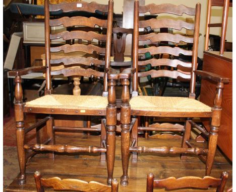 A set of ten beech Lancashire ladder back rush seat dining chairs (8+2)Condition report: Height 90cm, height to seat 46cm, wi