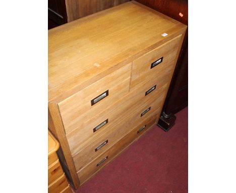 A contemporary light oak chest of two short over three long drawers, width 86cm