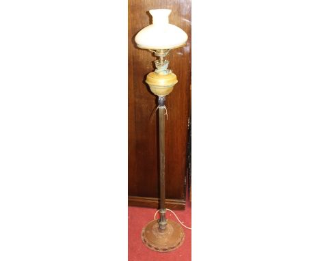 An early 20th century brass standard lamp with milk glass shade (converted from a paraffin lamp)