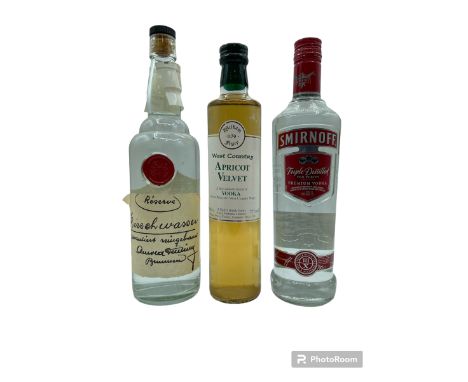 Three bottles to include Kirschwasser Dettling Reserve 70cl, West Country Apricot Velvet Vodka 500ml 22%vol and Smirnoff Prem