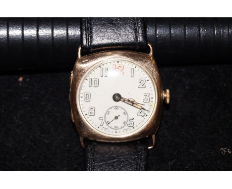 1920's 9ct gold cased wristwatch with leather strap. Manual wind, currently ticking. Very clean watch. Inscribed on the back 