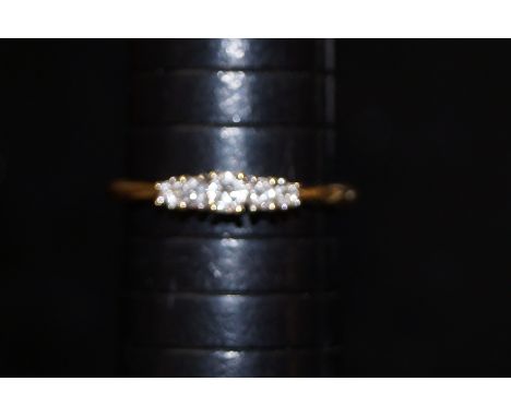 18 ct gold and 5 stone diamond ring approximately 0.25 ct size R