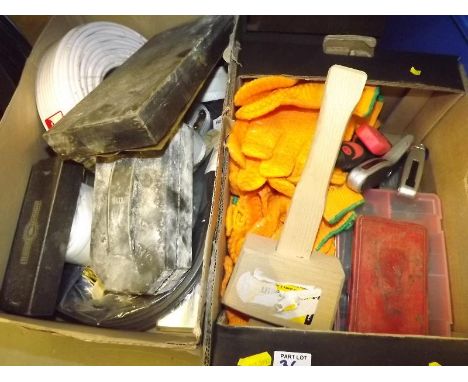 Two boxes of tools, hardware gloves and similar, predominantly unused