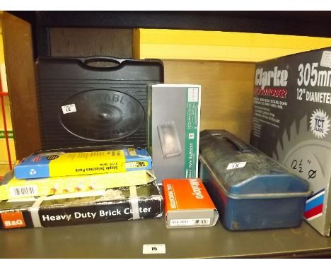 A B&Q heavy duty brick cutter, staple selection pack, pliers, portable gas stove and further unused tools and equipment (qty)