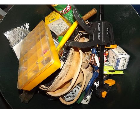 A quantity of tools and hardware, brushes and similar