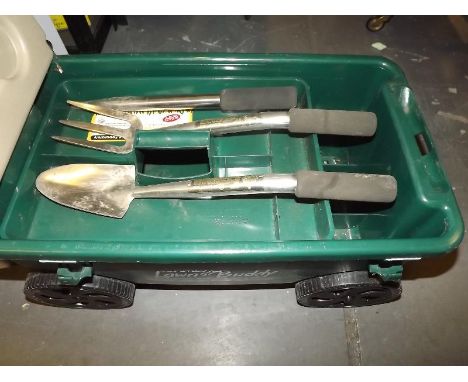 A Lawn Buddy by Ames, with tools