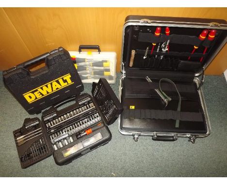 A heavy duty tool box with fitted interior, chisel set and two drill bit cases (qty) - Est £30 - £50 