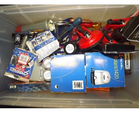 A mixed lot of tools and hard ware to include suction lifters, paint, drill bits and similar - Est £30 - £50