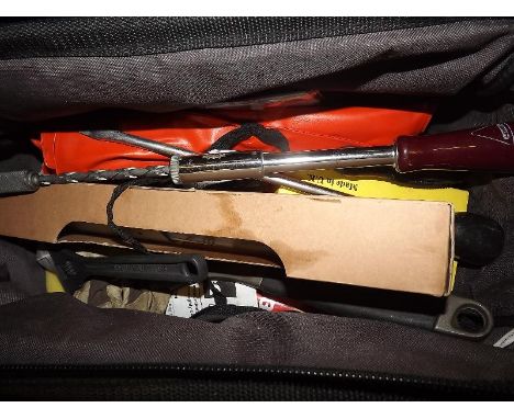 A tool bag with tools, hardware and similar